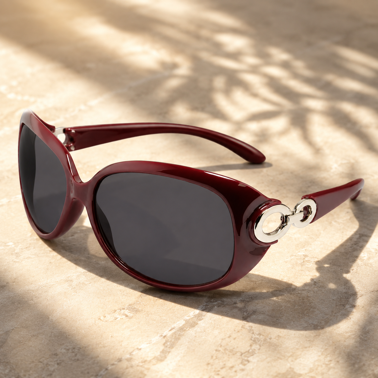 Lunettes de soleil femme rouges élégantes – Monture design avec détails métalliques